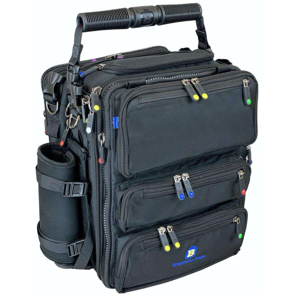 Black BrightLine B7 modular flight bag with multiple zippered compartments, carrying handle, and side bottle holder.