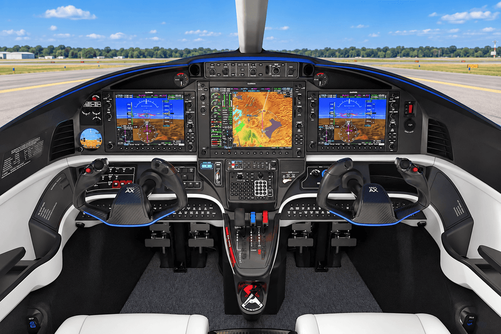 Epic E1000 AX Autoland flight deck showing three Garmin G1000 NXi displays, dual control yokes and a sunny airport view through the windshield.
